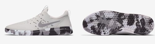 Zapatillas grises con suela de camuflaje de Nike.
