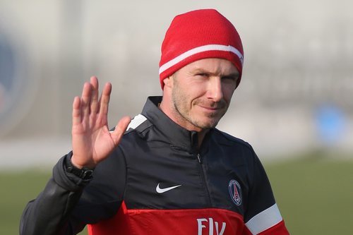 David Beckham entrenando con gorro de punto.